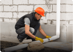 man working on water and sewage treatment